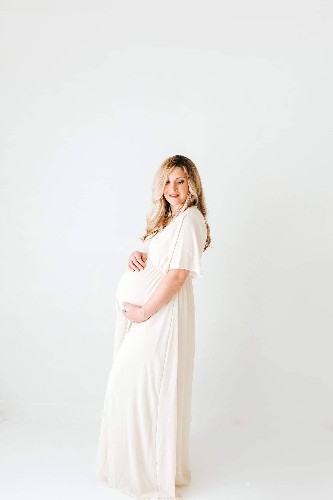 white studio maternity photo